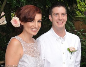 Laura and Chris Husson, 35 and 38, on their 2013 wedding day. Chris lives 11,000 miles away in New Zealand