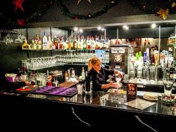 The fully-stocked bar is definitely not what you’d expect from a typical gas station